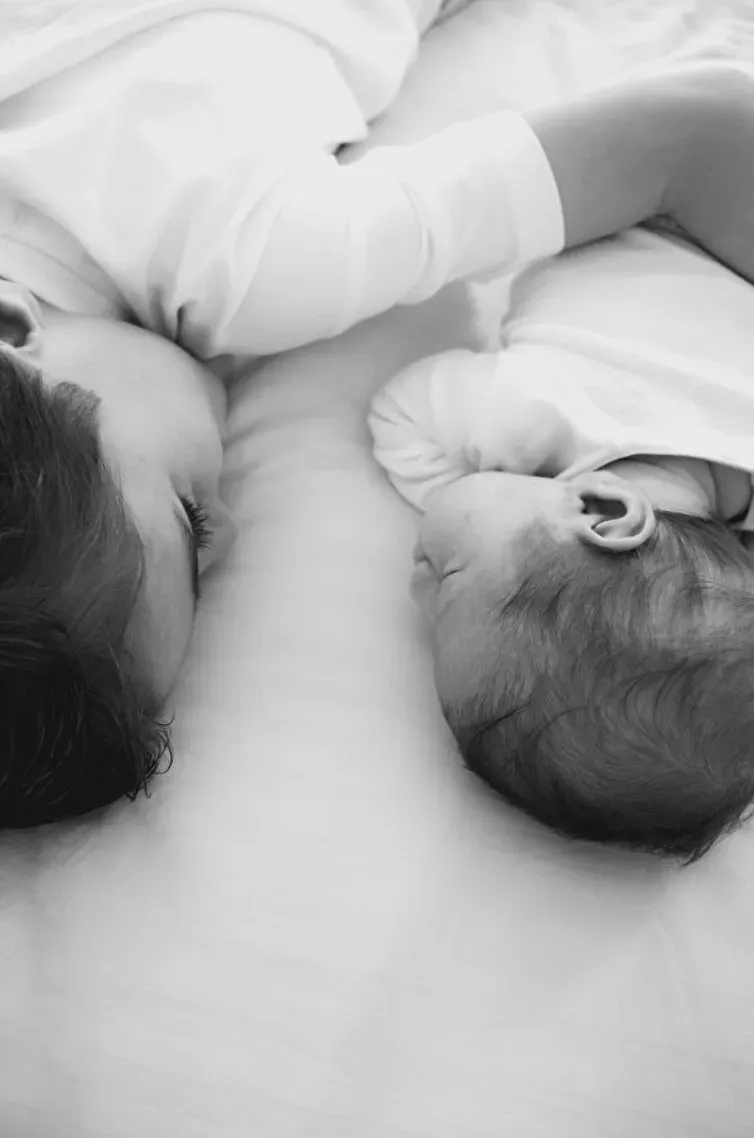 Séance famille — un parent et son bébé